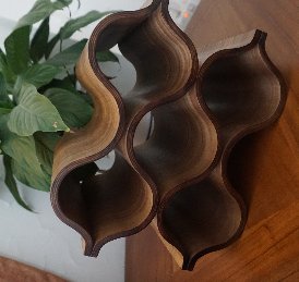 6 bottle undulating walnut fasion wine rack